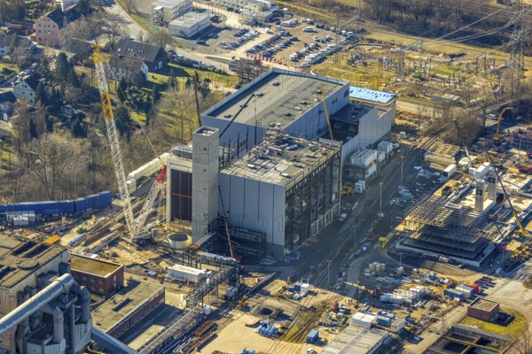 Aerial photo, STEAG combined heat and power plant Herne on the Rhine-Herne Canal, construction site new gas and steam power plant, Baukau-West, Herne, Ruhr area, North Rhine-Westphalia, Germany, construction work, construction, construction area, construction site, construction project, construction site, DE, steam cloud, power plant, Europe, district heating, combined cycle power plant, Hertener Straße, power plant, aerial view, aerial photography, aerial photography, Rhine-Ruhr metropolitan region, new construction, smoke cloud, coal-fired power plant, overview, bird's-eye view, overview