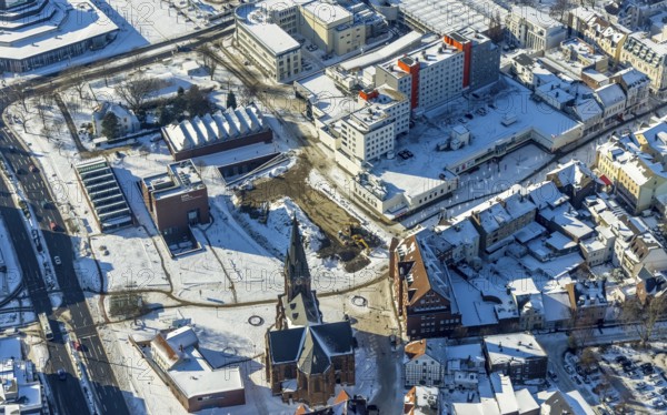 Aerial view, Europaplatz, high-rise residential building at the City Centre Bahnhofstraße, construction site Europagarten at the LWL Museum of Archaeology, Kreuzkirche, Herne-Mitte, Herne, Ruhr area, North Rhine-Westphalia, Germany, place of worship, construction work, construction area, construction site, building plots, construction project, construction site, DE, Europe, religious community, place of worship, holy site, church, church community, denomination, aerial view, aerial photography, aerial photography, religion, religious site, snow, overview, bird's-eye view, Westphalian State Museum, winter, birds-eyes view, overview