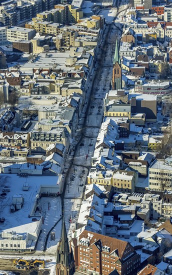 Aerial view, Bahnhofstraße and St. Bonifatius Catholic Church, Herne-Mitte, Herne, Ruhr area, North Rhine-Westphalia, Germany, place of worship, DE, shopping street, Europe, pedestrian zone, commercial buildings, religious community, place of worship, holy place, church, parish, denomination, aerial view, aerial photography, aerial photography, religion, religious site, snow, overview, bird's-eye view, winter, residential buildings, birds-eyes view, overview