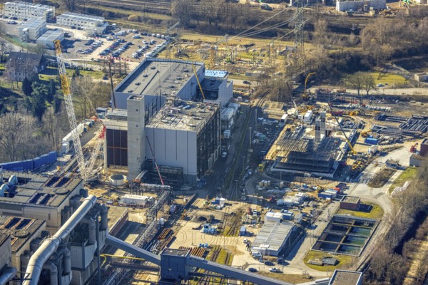 Aerial photo, STEAG combined heat and power plant Herne on the Rhine-Herne Canal, construction site new gas and steam power plant, Baukau-West, Herne, Ruhr area, North Rhine-Westphalia, Germany, construction work, construction, construction area, construction site, construction project, construction site, DE, steam cloud, power plant, Europe, district heating, combined cycle power plant, Hertener Straße, power plant, aerial view, aerial photography, aerial photography, Rhine-Ruhr metropolitan region, new construction, smoke cloud, coal-fired power plant, overview, bird's-eye view, overview