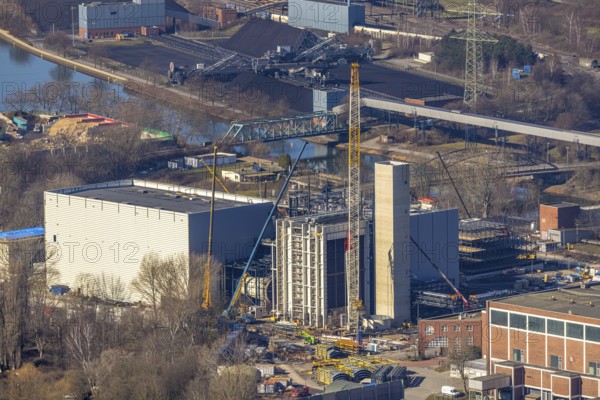 Aerial photo, STEAG combined heat and power plant Herne on the Rhine-Herne Canal, construction site new gas and steam power plant, Baukau-West, Herne, Ruhr area, North Rhine-Westphalia, Germany, construction work, construction, construction area, construction site, construction project, construction site, DE, steam cloud, power plant, Europe, district heating, combined cycle power plant, Hertener Straße, power plant, aerial view, aerial photography, aerial photography, Rhine-Ruhr metropolitan region, new construction, smoke cloud, coal-fired power plant, overview, bird's-eye view, overview