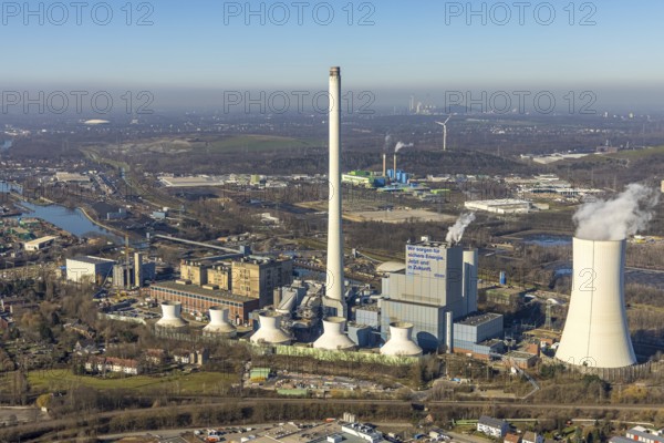 Aerial photo, STEAG combined heat and power plant Herne on the Rhine-Herne Canal, construction site new gas and steam power plant, Baukau-West, Herne, Ruhr area, North Rhine-Westphalia, Germany, construction work, construction, construction area, construction site, construction project, construction site, DE, steam cloud, power plant, Europe, district heating, combined cycle power plant, Hertener Straße, power plant, aerial view, aerial photography, aerial photography, Rhine-Ruhr metropolitan region, new construction, smoke cloud, coal-fired power plant, overview, bird's-eye view, overview