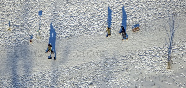 Aerial view, snow walk in Flottmannpark, Herne-Süd, Herne, Ruhr area, North Rhine-Westphalia, Germany, DE, Europe, shapes and colours, aerial view, aerial photography, aerial photography, sledging, snow, walker, overview, bird's eye view, winter, birds-eyes view, overview