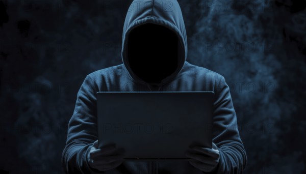 Dark Face Of Cyber Crime: Anonymous Hooded Hacker With Laptop Engaged In Internet Malware And System Break-Ins, AI generated