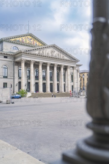 Detailed side view of a magnificent building with columns in Munich, Munich, Germany