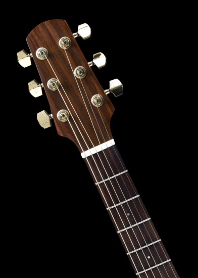 Detail of a acoustic guitar in black back