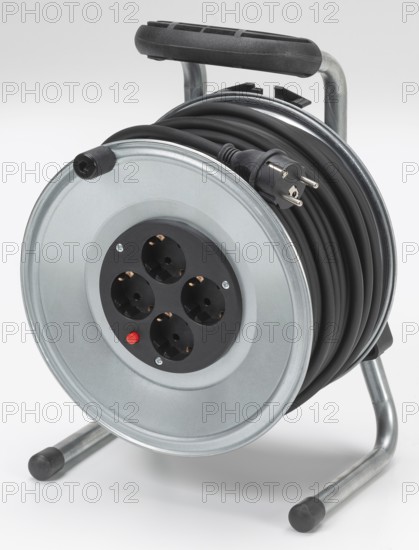 Metallic cable drum in white back with shadow