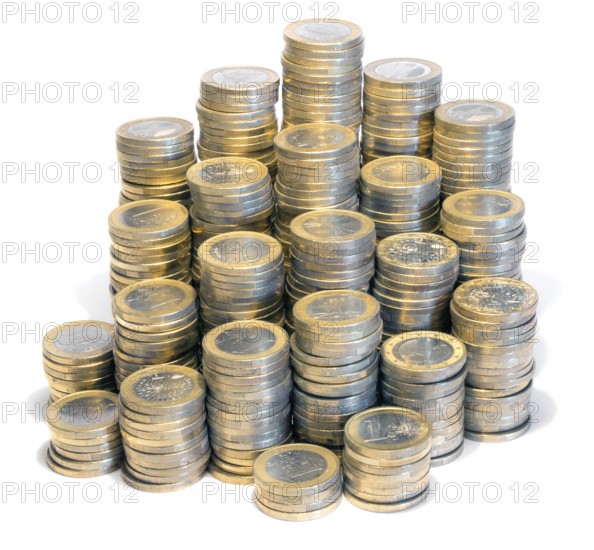 Lots of stacked 1 euro coins in white back