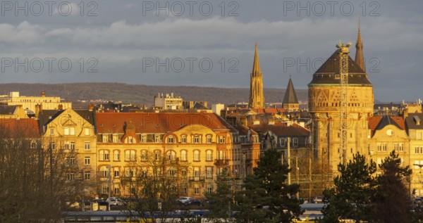 Sunny illuminated high angle view of Metz, a city in the Lorraine region at northeast France at evening time