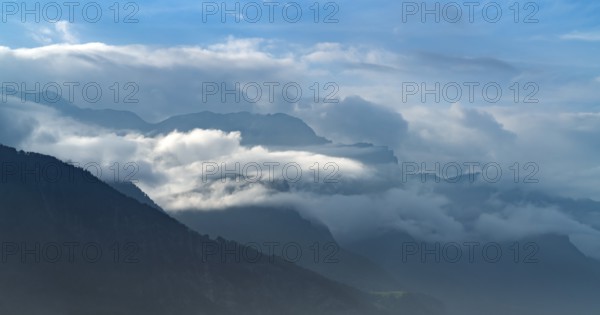 Clouded alpine scenery seen in northern Italy