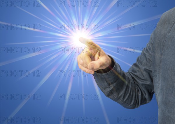 Pointing male hand with starlight in blue back