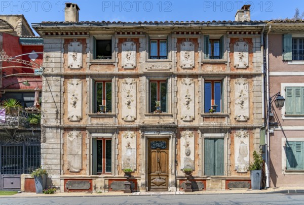 House facade in Fontaine-de-Vaucluse, a commune near a same named spring in the southeastern French department of Vaucluse