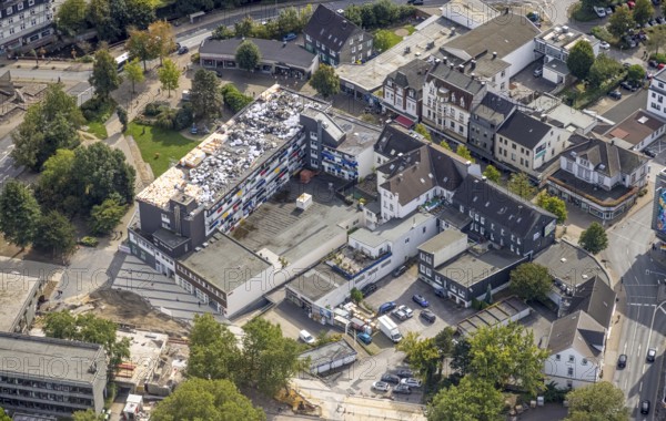 Aerial photo, roof construction work on the Mittelstraße shopping centre and residential building in the Haufe district of Gevelsberg, Ruhr area, North Rhine-Westphalia, Germany, construction work, building plots, construction project, construction site, DE, Europe, Gevelsberg, aerial photo, aerial photography, aerial photography, overview, bird's-eye view, overview
