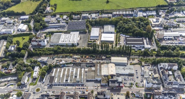 Aerial view, commercial area Hagener Straße in the district In der Bredde in Gevelsberg, Ruhr area, North Rhine-Westphalia, Germany, DE, Europe, Gevelsberg, commercial enterprises, commercial area, commercial park, commercial location, commercial use, industrial area, industrial building, industrial location, roundabout, roundabout, aerial photograph, aerial photography, aerial photography, overview, bird's-eye view, bird's-eye view, overview