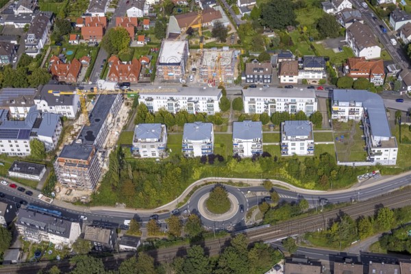 Aerial view, construction site and new senior citizens' home next to the Hans-Grünewald-Haus and Heideschulstraße residential complex in the Rosendahl district of Gevelsberg, Ruhr area, North Rhine-Westphalia, Germany, construction work, construction area, building site, building plots, construction project, construction site, care and nursing, DE, Europe, Evangelische Stiftung Volmarstein, Gevelsberg, property tax, real estate, roundabout, roundabout, aerial view, aerial photography, aerial photography, new building, care facility, retirement home, overview, bird's-eye view, residential complex, living and living, residential buildings, housing estate, birds-eyes view, overview