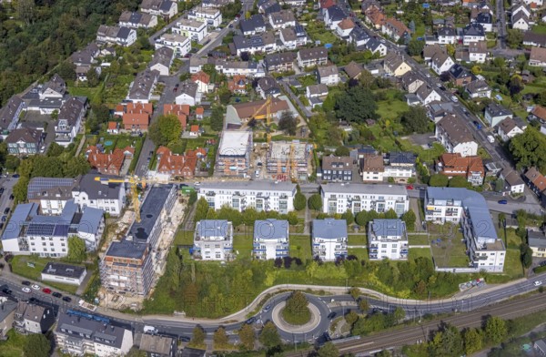 Aerial view, construction site and new senior citizens' home next to the Hans-Grünewald-Haus and Heideschulstraße residential complex in the Rosendahl district of Gevelsberg, Ruhr area, North Rhine-Westphalia, Germany, construction work, construction area, building site, building plots, construction project, construction site, care and nursing, DE, Europe, Evangelische Stiftung Volmarstein, Gevelsberg, property tax, real estate, roundabout, roundabout, aerial view, aerial photography, aerial photography, new building, care facility, retirement home, overview, bird's-eye view, residential complex, living and living, residential buildings, housing estate, birds-eyes view, overview