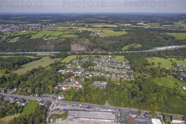 Aerial view, residential area Bruchmühle and adjacent forest damage on the A1 motorway in the Sauerbruch district of Gevelsberg, Ruhr area, North Rhine-Westphalia, Germany, A1 motorway, tree death, bark beetle damage, bark beetle plague, DE, Europe, Gevelsberg, property tax, real estate, clear-cutting, aerial view, aerial photography, aerial photography, overview, bird's-eye view, forest damage, forest dieback, residential area, housing and living, residential area, residential buildings, residential quality, residential neighbourhood, housing estate, birds-eyes view, overview