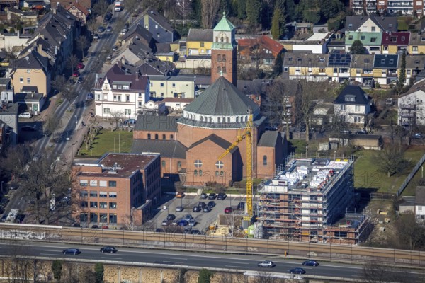 Aerial view, cath. Heilig-Kreuz-Kirche, medical centre Gladbeck, construction site former Kotten Kleimann, planned second medical centre, Butendorf, Gladbeck, Ruhr area, North Rhine-Westphalia, Germany, place of worship, construction work, construction area, construction site, building plots, construction crane, construction project, construction project, construction site, DE, Europe, religious community, place of worship, holy place, church, parish, denomination, aerial view, aerial photography, aerial photography, new building, religion, religious site, overview, bird's-eye view, overview