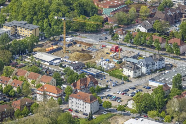 Aerial view, construction site new building for housing and social affairs, former Mercedes-Lueg site Wilhelmstraße, Gladbeck, Ruhr area, North Rhine-Westphalia, Germany, construction work, construction, construction area, construction site, building plots, construction crane, construction project, construction site, DE, Europe, aerial view, aerial photography, aerial photography, new building, overview, bird's-eye view, bird's-eye view, overview