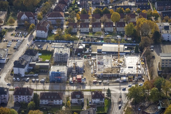 Aerial view, construction site with new building for housing and social services on the former Mercedes-Lueg site Wilhelmstraße in Gladbeck, Ruhr area, North Rhine-Westphalia, Germany, construction work, construction, construction area, construction site, building plots, construction crane, construction project, construction site, DE, Europe, Gladbeck, aerial view, aerial photography, aerial photography, new building, overview, bird's-eye view, bird's-eye view, overview