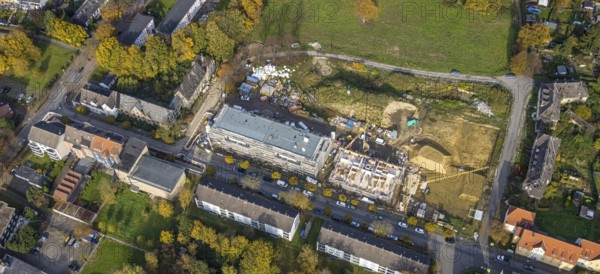 Aerial view, Schlägel und Eisen housing estate with construction site for the new construction of a nursing home for the elderly and residential quarter on the corner of Bohnekampstrasse and Schlägelstrasse in the district of Zweckel in Gladbeck, Ruhr area, North Rhine-Westphalia, Germany, residential home for the elderly, construction work, construction area, construction site, building plots, construction project, construction project, construction site, care and nursing, DE, Europe, Gladbeck, property tax, real estate, aerial view, aerial photography, aerial photography, new construction, care facility, retirement home, overview, bird's-eye view, residential complex, living and living, residential area, residential buildings, residential quality, residential neighbourhood, housing estate, birds-eyes view, overview