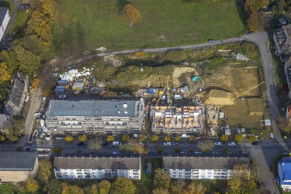 Aerial view, Schlägel und Eisen housing estate with construction site for the new construction of a nursing home for the elderly and residential quarter on the corner of Bohnekampstrasse and Schlägelstrasse in the district of Zweckel in Gladbeck, Ruhr area, North Rhine-Westphalia, Germany, residential home for the elderly, construction work, construction area, construction site, building plots, construction project, construction project, construction site, care and nursing, DE, Europe, Gladbeck, property tax, real estate, aerial view, aerial photography, aerial photography, new construction, care facility, retirement home, overview, bird's-eye view, residential complex, living and living, residential area, residential buildings, residential quality, residential neighbourhood, housing estate, birds-eyes view, overview