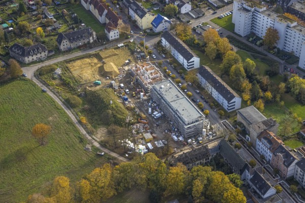 Aerial view, Schlägel und Eisen housing estate with construction site for the new construction of a nursing home for the elderly and residential quarter on the corner of Bohnekampstrasse and Schlägelstrasse in the district of Zweckel in Gladbeck, Ruhr area, North Rhine-Westphalia, Germany, residential home for the elderly, construction work, construction area, construction site, building plots, construction project, construction project, construction site, care and nursing, DE, Europe, Gladbeck, property tax, real estate, aerial view, aerial photography, aerial photography, new construction, care facility, retirement home, overview, bird's-eye view, residential complex, living and living, residential area, residential buildings, residential quality, residential neighbourhood, housing estate, birds-eyes view, overview