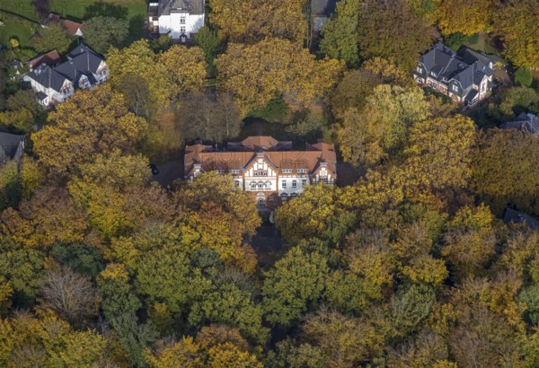Aerial view, music school of the city of Gladbeck in the autumnal forest in the district Rentfort in Gladbeck, Ruhr area, North Rhine-Westphalia, Germany, DE, Europe, Gladbeck, aerial view, aerial photography, aerial photography, school, overview, bird's eye view, birds-eyes view, overview