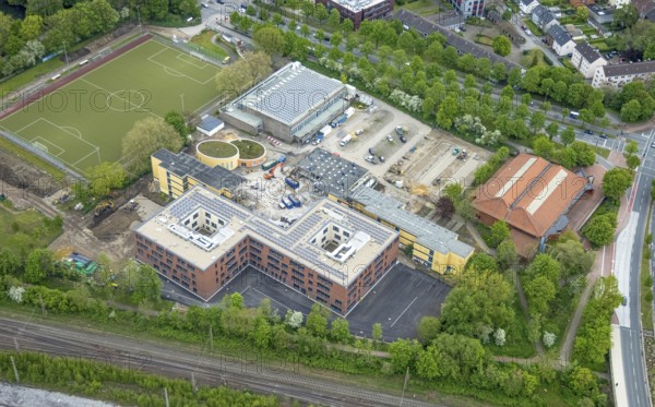 Aerial view, construction site and new building Heisenberg-Gymnasium, Gladbeck, Ruhr area, North Rhine-Westphalia, Germany, expansion areas, construction work, construction project, construction site, education, educational institution, DE, renewal, Europe, grammar school, capacity requirements, Konrad-Adenauer-Allee, teaching institute, aerial view, aerial photography, aerial photography, school, overview, bird's-eye view, overview