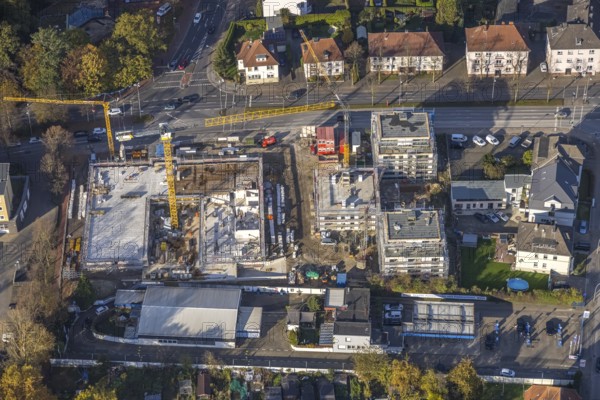 Aerial view, construction site with new building for housing and social services on the former Mercedes-Lueg site Wilhelmstraße in Gladbeck, Ruhr area, North Rhine-Westphalia, Germany, construction work, construction, construction area, construction site, building plots, construction crane, construction project, construction site, DE, Europe, Gladbeck, aerial view, aerial photography, aerial photography, new building, overview, bird's-eye view, bird's-eye view, overview