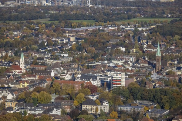 Aerial view, city view with town hall and Stadtsparkasse Gladbeck high-rise building as well as the catholic church St. Lamberti and Christus Kirche in Gladbeck, Ruhr area, North Rhine-Westphalia, Germany, place of worship, authority, citizens' office, city, DE, Europe, finance, Gladbeck, religious community, place of worship, holy place, city centre, church, parish, denomination, aerial view, aerial photography, aerial photography, town hall, religion, religious site, skyline, savings bank, city view, city centre, overview, bird's-eye view, overview
