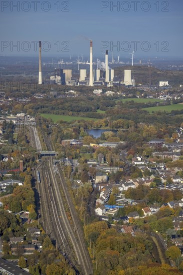 Aerial view, railway system and station Gladbeck West as well as Uniper power plants in the background in Gladbeck, Ruhr area, North Rhine-Westphalia, Germany, railway tracks, station, DE, Deutsche Bahn AG, Europe, Gladbeck, power plant, cooling towers, aerial view, aerial photography, aerial photography, overview, bird's eye view, overview