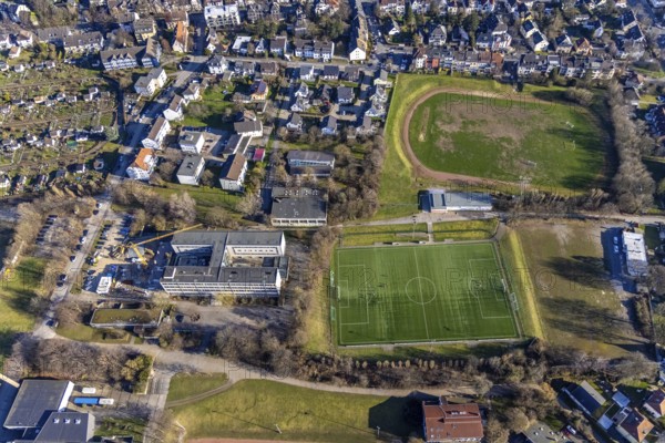 Aerial view, construction site new extension at Theodor-Heuss-Gymnasium, Am Sportpark, Altenhagen, Hagen, Ruhr area, North Rhine-Westphalia, Germany, construction work, building, construction area, building site, building plots, construction crane, construction project, construction site, education, educational institution, DE, Europe, football pitch, grammar school, Humpertstraße, educational institute, aerial view, aerial photography, aerial photography, new building, school, sports, sports facilities, sports field, sports facility, overview, bird's-eye view, overview