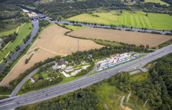 Aerial view, Lennhof service area on the A1 motorway with Lennemündung into the Ruhr in the district of Boele in Hagen, Ruhr area, North Rhine-Westphalia, Germany, motorway, DE, Europe, freight traffic, Hagen, aerial view, aerial photography, aerial photography, car parks, Lennhof service area, road traffic, overview, traffic volume, bird's eye view, overview