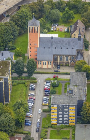 Aerial view, high-rise buildings and Catholic Church of the Sacred Heart of Jesus in the Eilpe district of Hagen, Ruhr area, North Rhine-Westphalia, Germany, place of worship, DE, Europe, religious community, place of worship, property tax, Hagen, sacred site, high-rise buildings, real estate, church, church community, denomination, aerial view, aerial photography, aerial photography, multi-family houses, religion, religious site, overview, bird's eye view, residential complex, living and life, residential buildings, housing estate, birds-eyes view, overview