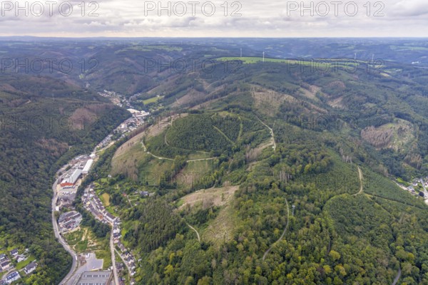 Aerial view, forest damage at Schleipenberg and Stoppelberg in the district Hohenlimburg in Hagen, Ruhr area, North Rhine-Westphalia, Germany, tree dieback, bark beetle damage, bark beetle plague, DE, Europe, commercial enterprises, commercial area, commercial area, commercial location, commercial use, Hagen, aerial view, aerial photography, aerial photography, overview, bird's eye view, forest area, forest damage, forest dieback, birds-eyes view, overview