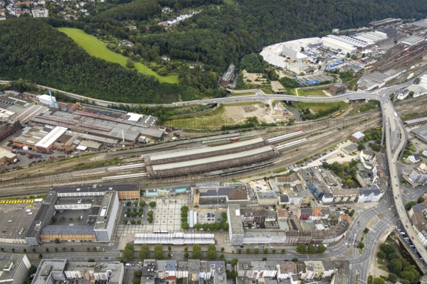 Aerial view, Hagen main station construction site with renovation in the district Mittelstadt in Hagen, Ruhr area, North Rhine-Westphalia, Germany, railway station, construction work, construction area, construction site, building site, construction project, construction site, DE, Deutsche Bahn AG, Europe, Hagen, main station, central station, aerial view, aerial photography, aerial photography, renovation, overview, bird's-eye view, overview