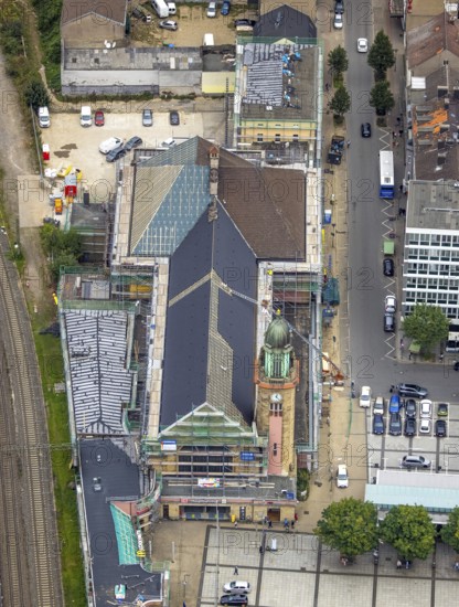 Aerial view, Hagen main station construction site with renovation in the district Mittelstadt in Hagen, Ruhr area, North Rhine-Westphalia, Germany, railway station, construction work, construction area, construction site, building site, construction project, construction site, DE, Deutsche Bahn AG, Europe, Hagen, main station, central station, aerial view, aerial photography, aerial photography, renovation, overview, bird's-eye view, overview
