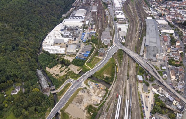 Aerial view, Westside City construction area and construction site between new road with river Ennepe and former screw factory Funcke and Hueck as well as main railway station in the district Altenhagen in Hagen, Ruhr area, North Rhine-Westphalia, Germany, railway tracks, railway station, construction work, construction area, construction site, building plots, construction measure, construction project, construction site, DE, Deutsche Bahn AG, Europe, Hagen, main railway station, main station, aerial view, aerial photography, aerial photography, overview, bird's eye view, birds-eyes view, overview