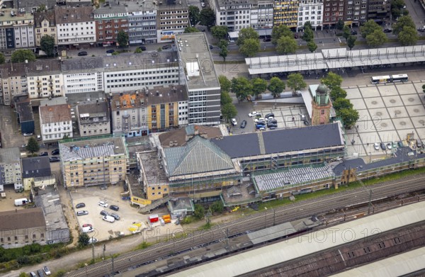Aerial view, Hagen main station construction site with renovation in the district Mittelstadt in Hagen, Ruhr area, North Rhine-Westphalia, Germany, railway station, construction work, construction area, construction site, building site, construction project, construction site, DE, Deutsche Bahn AG, Europe, Hagen, main station, central station, aerial view, aerial photography, aerial photography, renovation, overview, bird's-eye view, overview