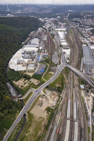 Aerial view, Westside City construction area and construction site between new road with river Ennepe and former screw factory Funcke and Hueck as well as main railway station in the district Altenhagen in Hagen, Ruhr area, North Rhine-Westphalia, Germany, railway tracks, railway station, construction work, construction area, construction site, building plots, construction measure, construction project, construction site, DE, Deutsche Bahn AG, Europe, Hagen, main railway station, main station, aerial view, aerial photography, aerial photography, overview, bird's eye view, birds-eyes view, overview