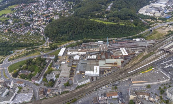 Aerial view, Deutsche Edelstahlwerke Schwanenstraße at Hagen main station and forest area Philippshöhe in the district Wehringhausen with the river Ennepe in Hagen, Ruhr area, North Rhine-Westphalia, Germany, DE, Europe, commercial enterprises, commercial area, commercial park, commercial location, commercial use, Hagen, industrial area, industrial building, industrial location, aerial view, aerial photography, aerial photography, overview, bird's-eye view, forest area, birds-eyes view, overview