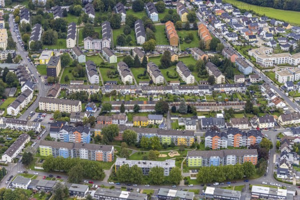 Aerial view, colourful house facades of the GWG housing estate on the street Am Quambusch in the Haspe-West district of Hagen, Ruhr area, North Rhine-Westphalia, Germany, DE, Europe, property tax, Hagen, real estate, aerial view, aerial photography, aerial photography, overview, bird's-eye view, housing estate, housing and living, residential area, residential buildings, quality of living, residential quarter, housing estate, birds-eyes view, overview