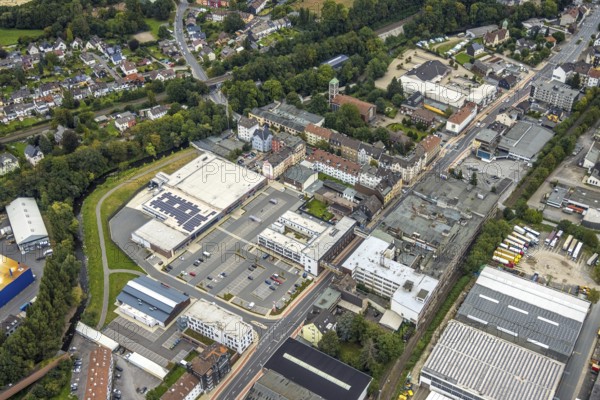 Aerial view, shopping centre and commercial area Enneper Straße as well as St. Konrad church and former Brandt factory in the Haspe-West district of Hagen, Ruhr area, North Rhine-Westphalia, Germany, place of worship, DE, shopping centre, shopping markets, shopping centre, Europe, commercial enterprises, commercial area, commercial park, commercial location, commercial use, religious community, place of worship, Hagen, holy site, industrial area, industrial site, church, church community, denomination, aerial view, aerial photography, aerial photography, local supply centre, religion, religious site, overview, bird's-eye view, overview