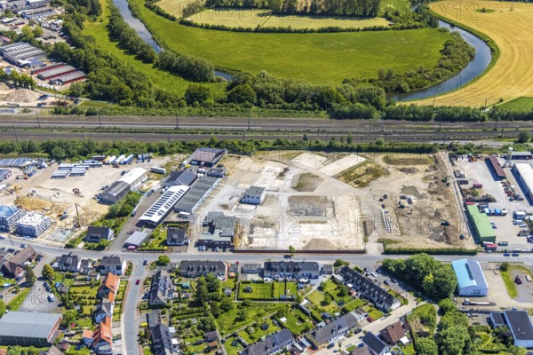 Aerial view, construction site at Annabergstraße for new construction of flats, former company site Klostermann, Lippebogen, Haltern-Stadt, Haltern am See, Ruhr area, North Rhine-Westphalia, Germany, Annabergstraße, railway tracks, construction work, construction, construction area, construction site, building plots, construction project, construction site, buses, DE, Europe, aerial view, aerial photography, aerial photography, new construction, overview, bird's eye view, birds-eyes view, overview
