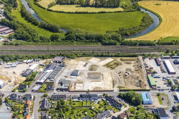 Aerial view, construction site at Annabergstraße for new construction of flats, former company site Klostermann, Lippebogen, Haltern-Stadt, Haltern am See, Ruhr area, North Rhine-Westphalia, Germany, Annabergstraße, railway tracks, construction work, construction, construction area, construction site, building plots, construction project, construction site, buses, DE, Europe, aerial view, aerial photography, aerial photography, new construction, overview, bird's eye view, birds-eyes view, overview