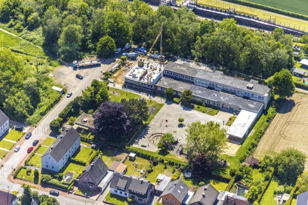 Aerial view, construction site extension Silverbergschule, Haltern-Stadt, Haltern am See, Ruhr area, North Rhine-Westphalia, Germany, construction work, construction area, building site, building plots, construction measure, construction project, construction site, education, educational institution, DE, Europe, teaching institute, aerial view, aerial photography, aerial photography, new building, school, overview, bird's eye view, birds-eyes view, overview