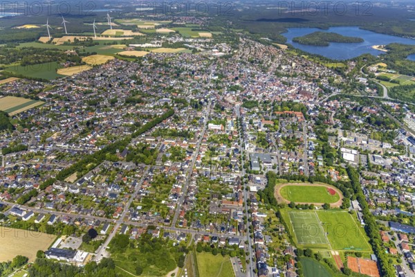 Aerial view, Old town with catholic St.Sixtus-Kirche, Altstadring, Haltern am See town hall, Conzeallee sports complex, view of Haltern reservoir, Haltern town, Haltern am See, Ruhr area, North Rhine-Westphalia, Germany, old town, view of old town, old town area, old town ring road, place of worship, authority, DE, Europe, football pitch, football stadium, religious community, place of worship, Holy city, church, parish, denomination, roundabout, roundabout, aerial view, aerial photography, aerial photography, town hall, religion, religious city, lake, vertical view, sports facilities, sports field, sports stadium, reservoir, overview, bird's-eye view, bird's-eye view, historic city centre, overview
