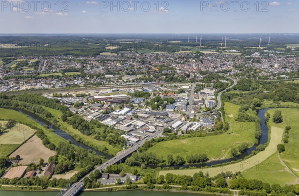 Aerial view, industrial estate south Recklinghäuser Straße, river Lippe with Lippebogen, canal bridge, Haltern-Stadt, Haltern am See, Ruhr area, North Rhine-Westphalia, Germany, bridge, bridge Recklinghäuser Straße, DE, Europe, commercial enterprises, commercial area, industrial estate, industrial park, commercial location, commercial use, industrial area, industrial building, industrial location, aerial view, aerial photography, aerial photography, overview, bird's-eye view, WEA, forest area, wind energy, wind energy plant, wind power, wind power plant, wind turbines, birds-eyes view, overview