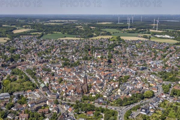 Aerial view, Old town with catholic St.Sixtus-Kirche, Altstadring, Haltern-Stadt, Haltern am See, Ruhr area, North Rhine-Westphalia, Germany, Old Town, Old Town view, Old Town area, Old Town ring road, Place of worship, DE, Europe, Religious community, Place of worship, Holy site, Church, Parish, Denomination, roundabout, roundabout, aerial view, aerial photography, aerial photography, religion, religious site, vertical view, overview, bird's-eye view, WEA, wind energy, wind energy plant, wind power, wind turbine, wind turbines, birds-eyes view, historic city centre, overview